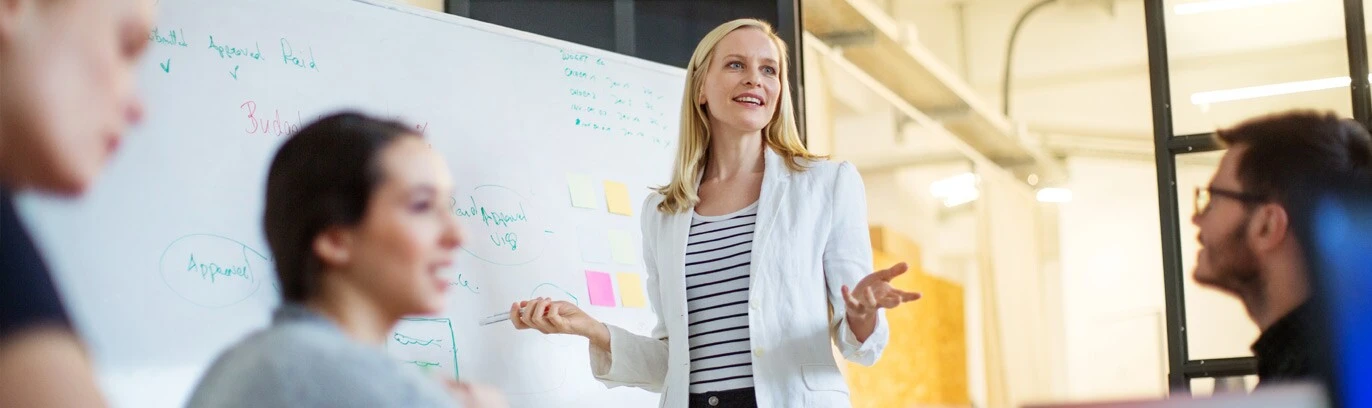 A group of people meeting about improving website traffic