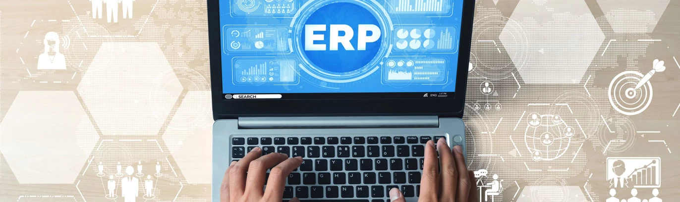 ERP eCommerce integration concept on a laptop with back-office data icons for products, orders, and fulfillment