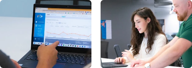 The OuterBox eCommerce website design company team working together on a computer