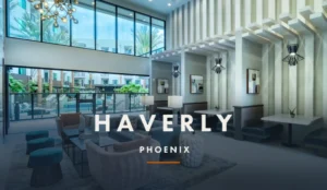 Haverly Phoenix luxury apartment community lobby and lounge in midtown Phoenix, AZ, with the property's official HAVERLY PHOENIX wordmark