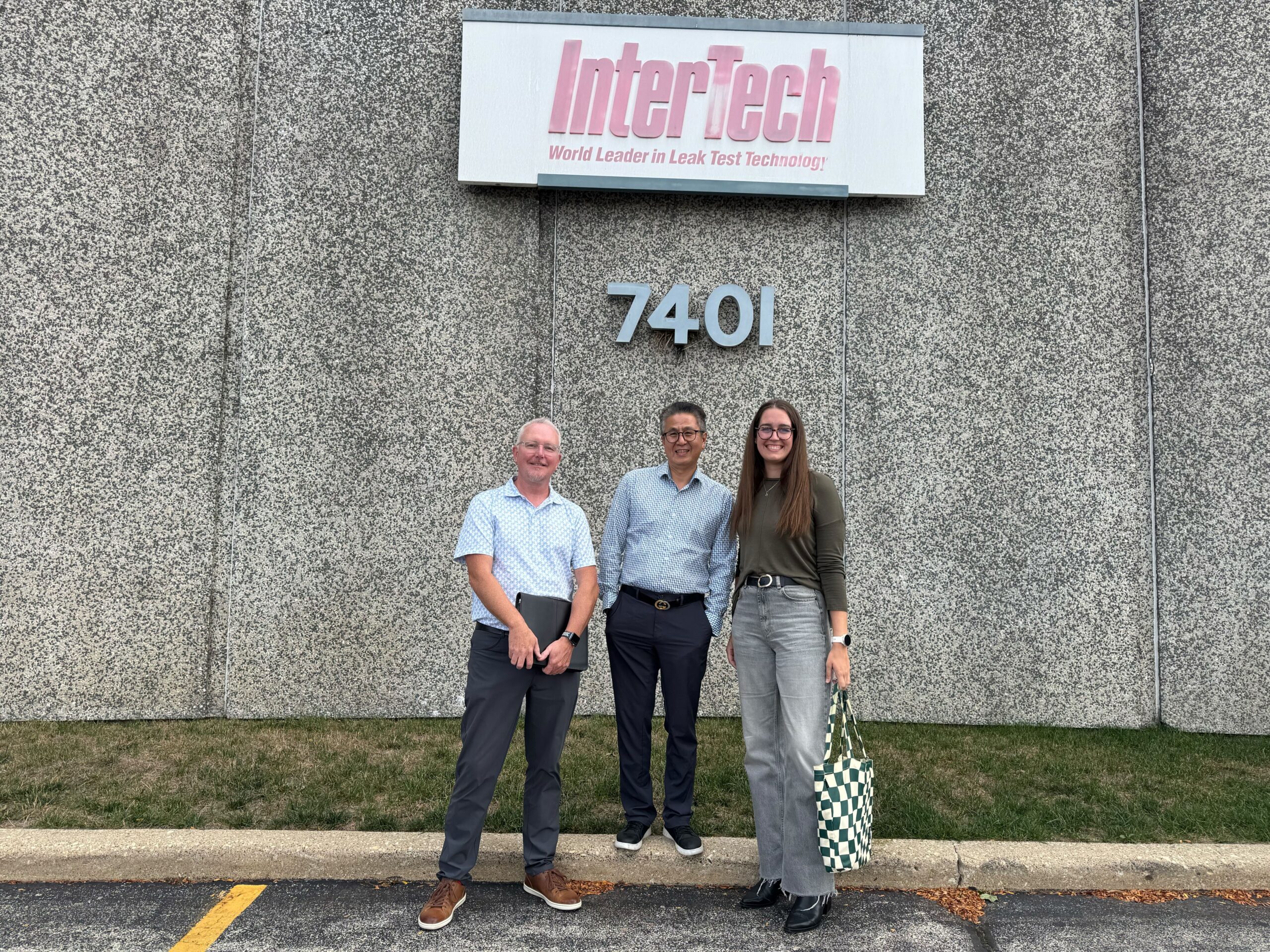 OuterBox team outside InterTech during an industrial client visit for distributor marketing planning