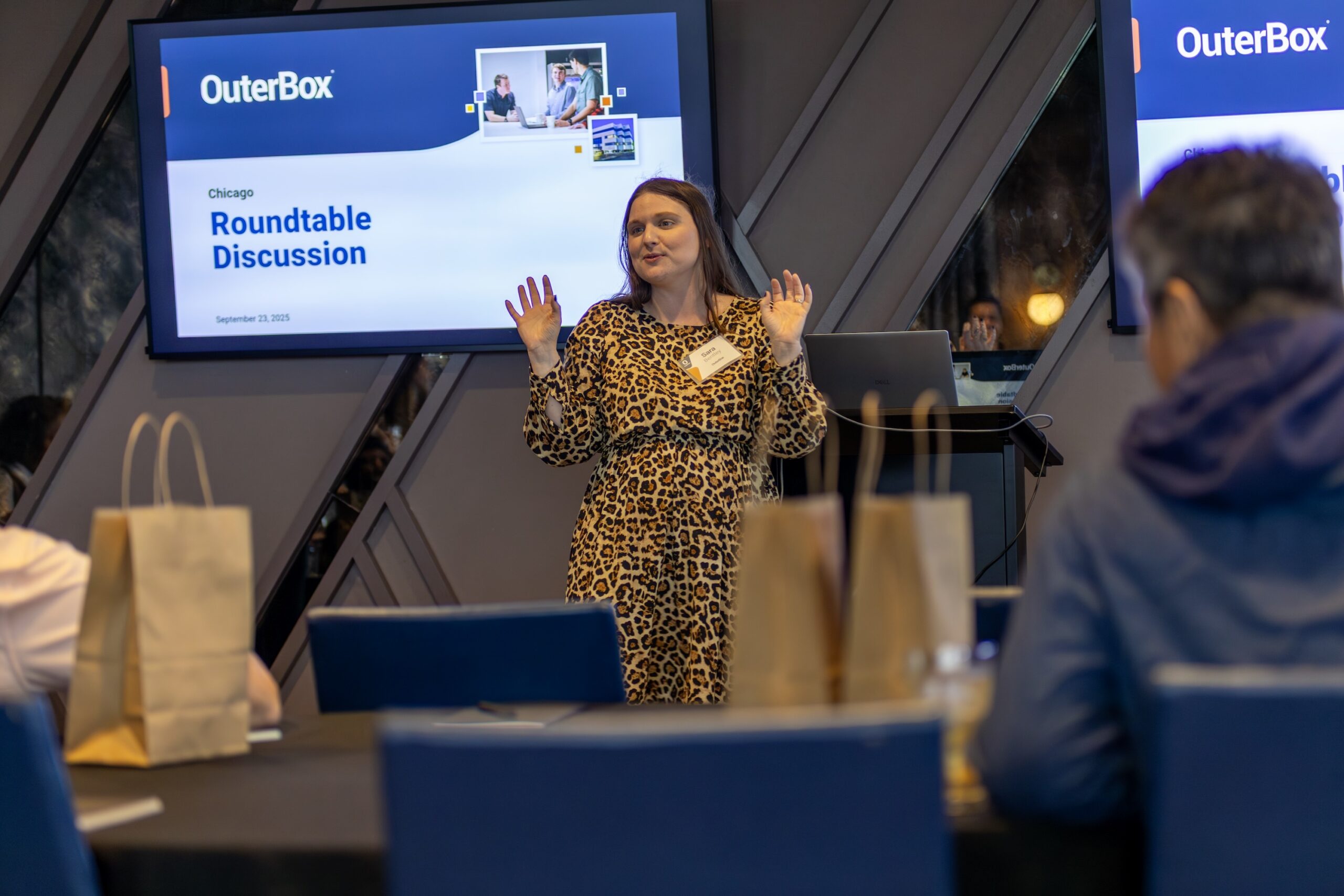 OuterBox presenter leading manufacturing marketing agency process discussion at a client roundtable.