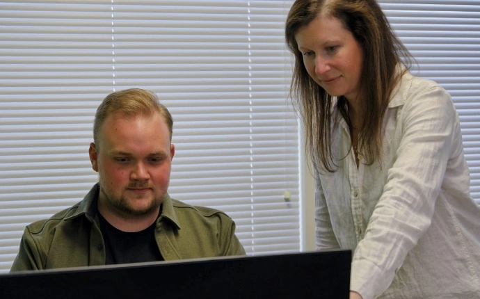 OuterBox team reviewing PPC lead generation management services for a B2B client