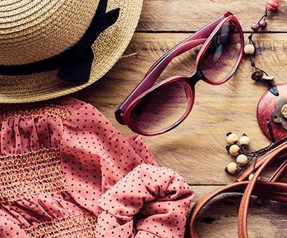 Fashion accessories and clothing representing a Nadine West subscription outfit