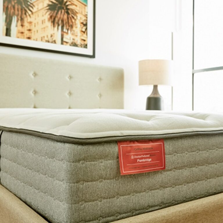 Ortho Mattress mattress displayed in a bedroom