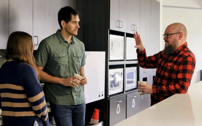OuterBox targeted email marketing agency team discussing campaign strategy