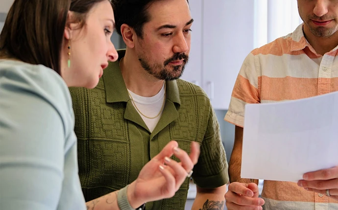 OuterBox team reviewing a health plan marketing strategy and connected channel plan