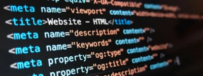 Healthcare SEO services represented by website code, title tags, and metadata on a computer screen