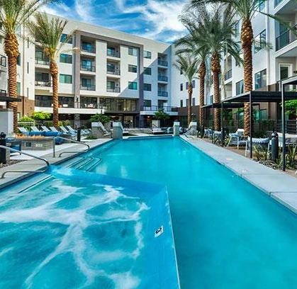 Haverly resort-style pool courtyard with palm trees